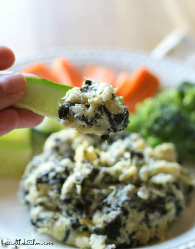 A close up of a plate of spinach dip