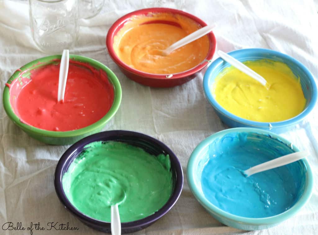 bowls of colored frosting