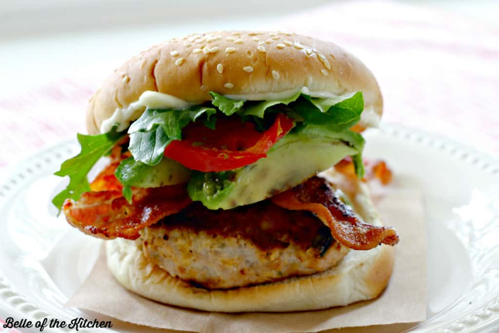 A close up of a burger on a plate