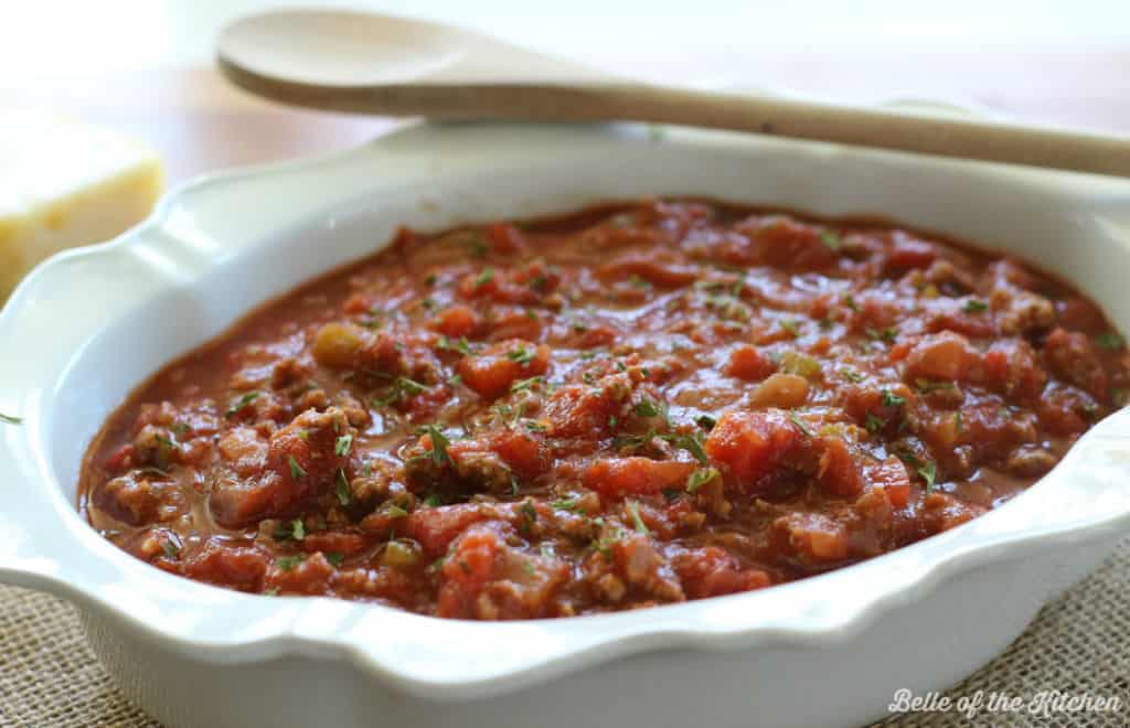 Homemade spaghetti sauce in a white serving bowl. 