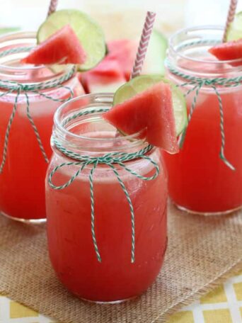 three glasses full of watermelon lemonade