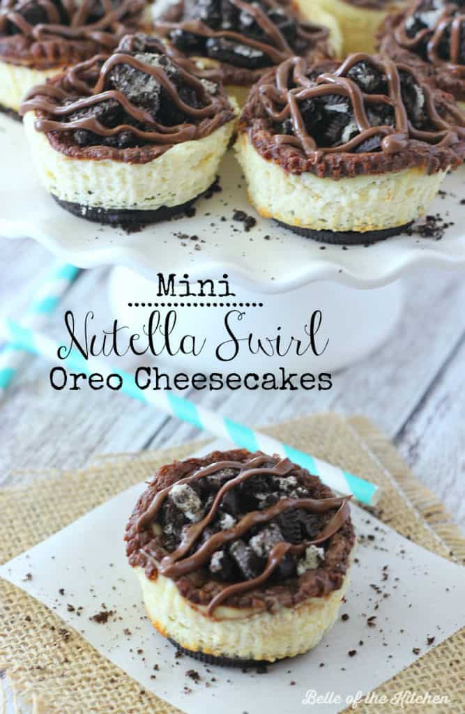 A bunch of mini cheesecakes topped with Oreos and chocolate
