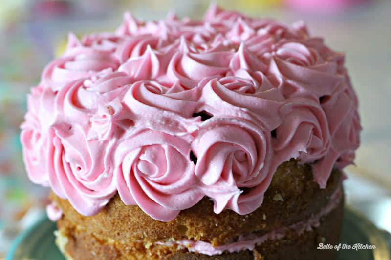 pink frosting on top of a cake