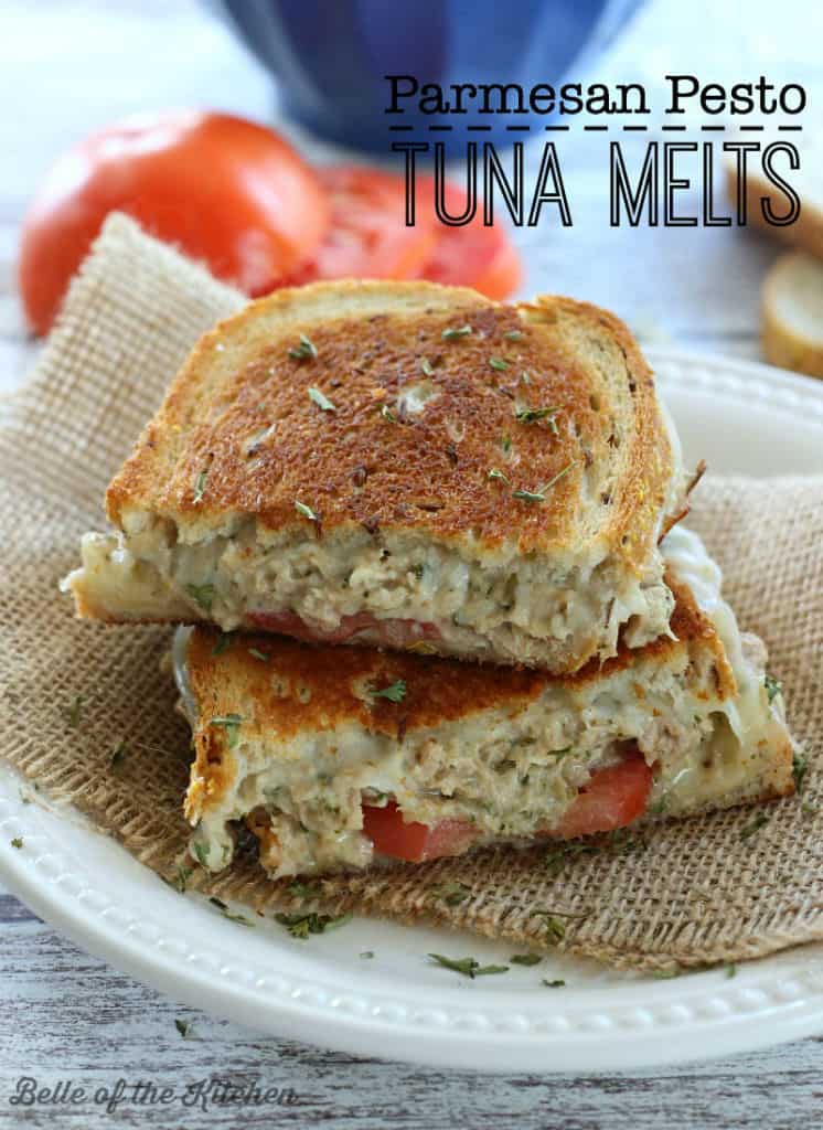 A close up of tuna pesto melts with sliced tomato