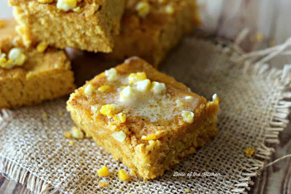 A close up of a piece of cornbread