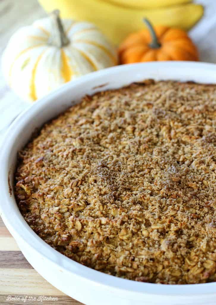 A pie plate filled with pumpkin baked oatmeal