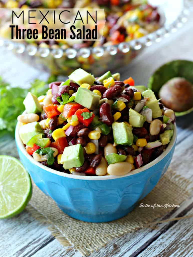 A bowl of bean salad with diced avocado