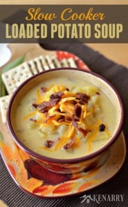 A bowl of potato soup topped with cheese and bacon