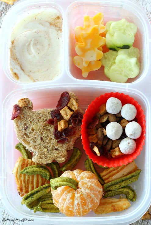 A plastic container filled with different types of food