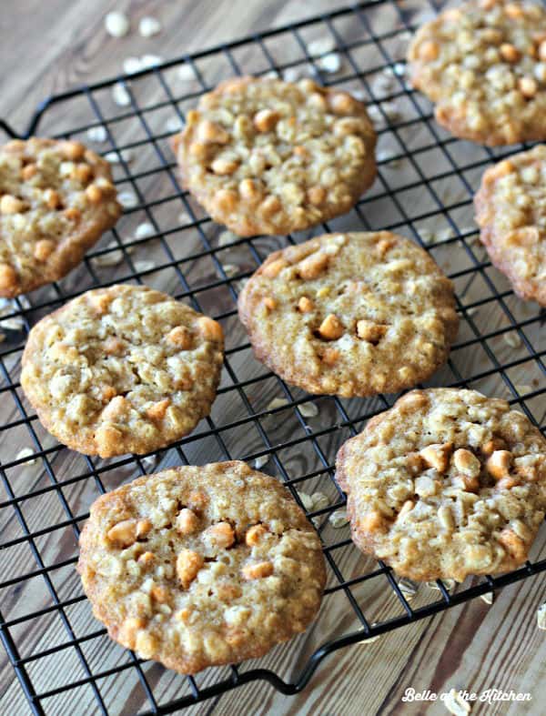 a wire rack filled with oatmeal cookies