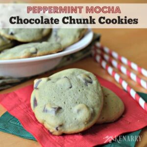 a stack of chocolate chunk cookies beside a plate