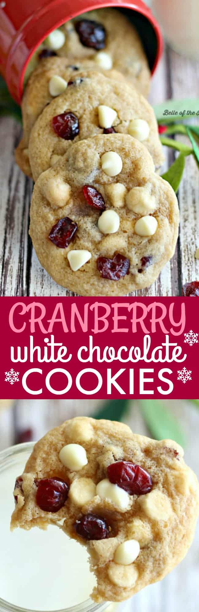 a plate of cookies with white chocolate chips and cranberries
