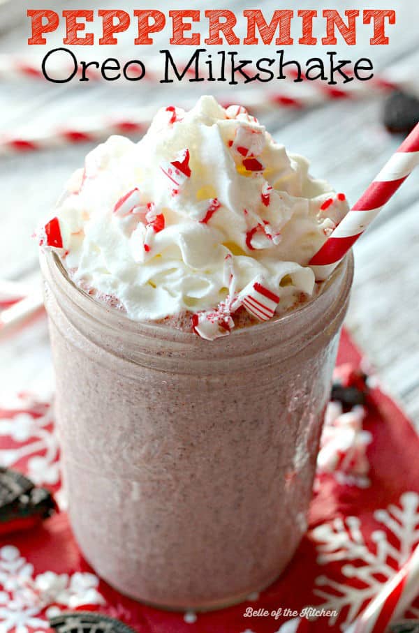 a milkshake with whipped cream and chopped peppermint on top