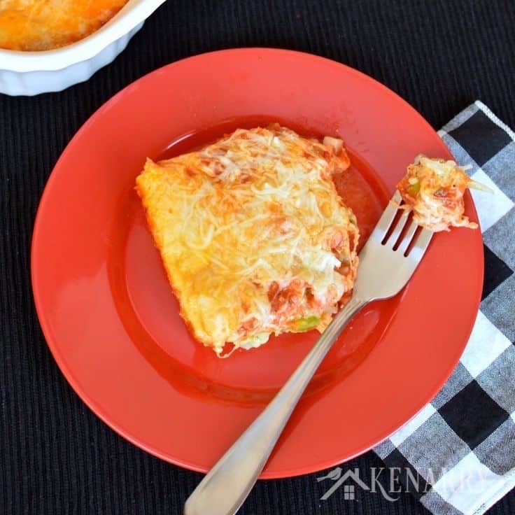 A plate of food topped with breakfast pizza casserole