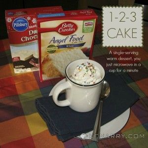 two boxes of cake mix next to a mug