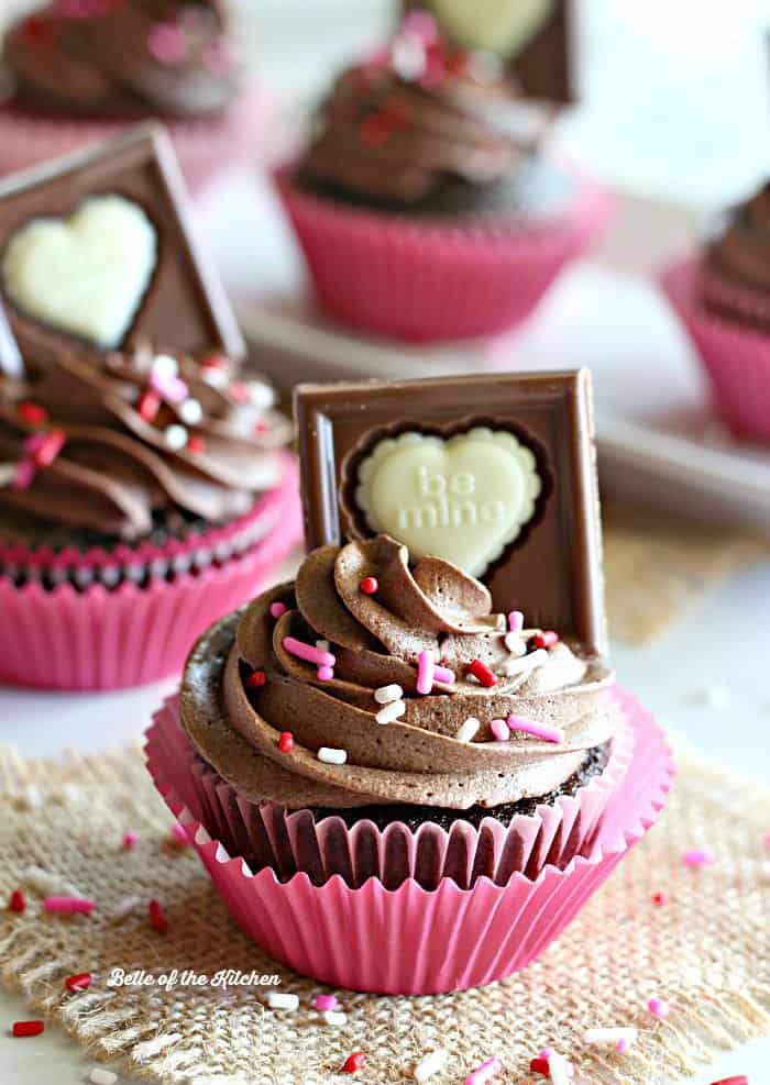 A close up of decorated cupcakes on a table