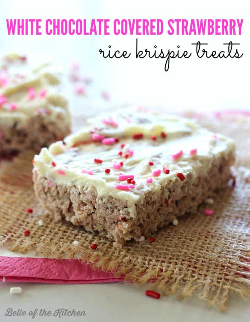 A close up of a Rice Krispie treat topped with frosting and pink sprinkles