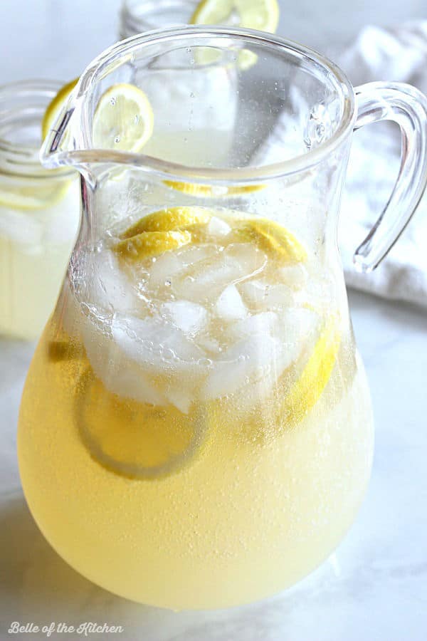 a pitcher full of lemonade