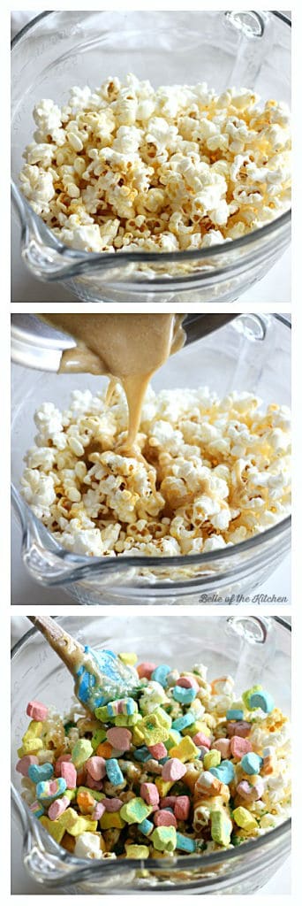 a bowl of popcorn with sauce being poured on top