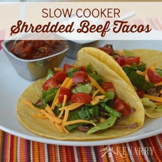 With only 4 ingredients, these slow cooker shredded beef tacos couldn't be easier. Just add your favorite toppings for a delicious weeknight dinner!