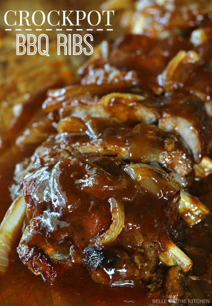 A close up of sliced ribs on a cutting board