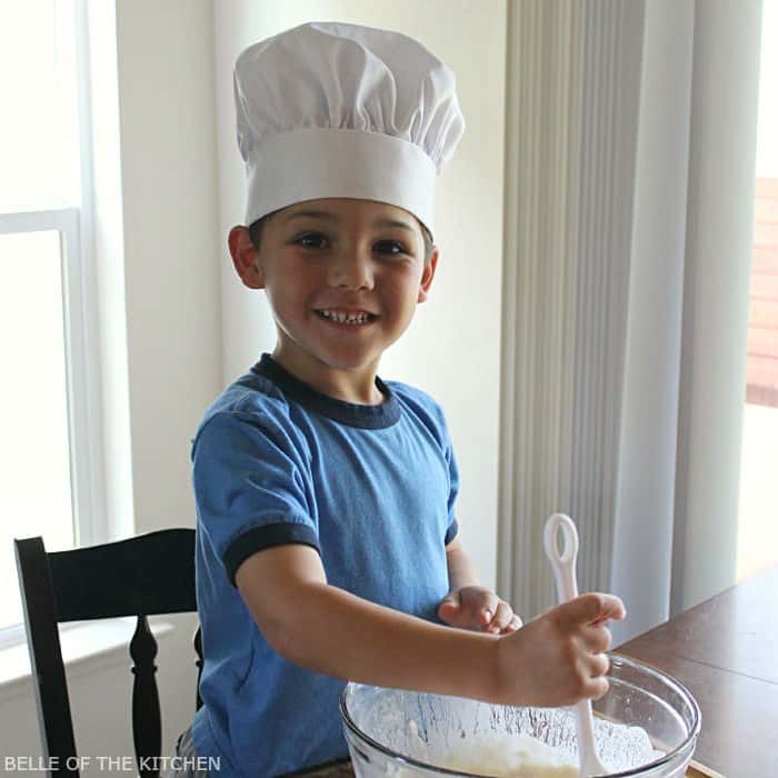 A young boy wearing a hat