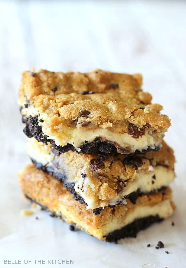 A close up of Oreo cheesecake bars in a stack