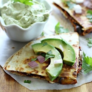 Juicy chicken cooks with a smoky bacon bbq sauce in your slow cooker, then pairs with gooey cheese to make these yummy quesadillas.