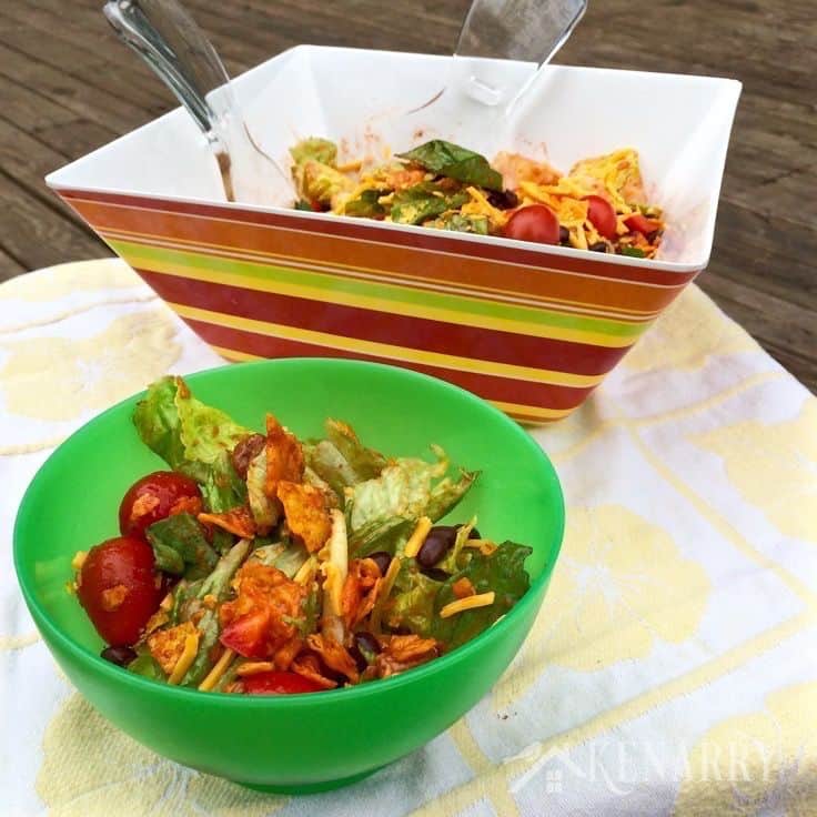 two bowls filled with taco salad