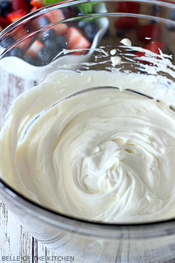 A glass bowl filled with Cheesecake filling