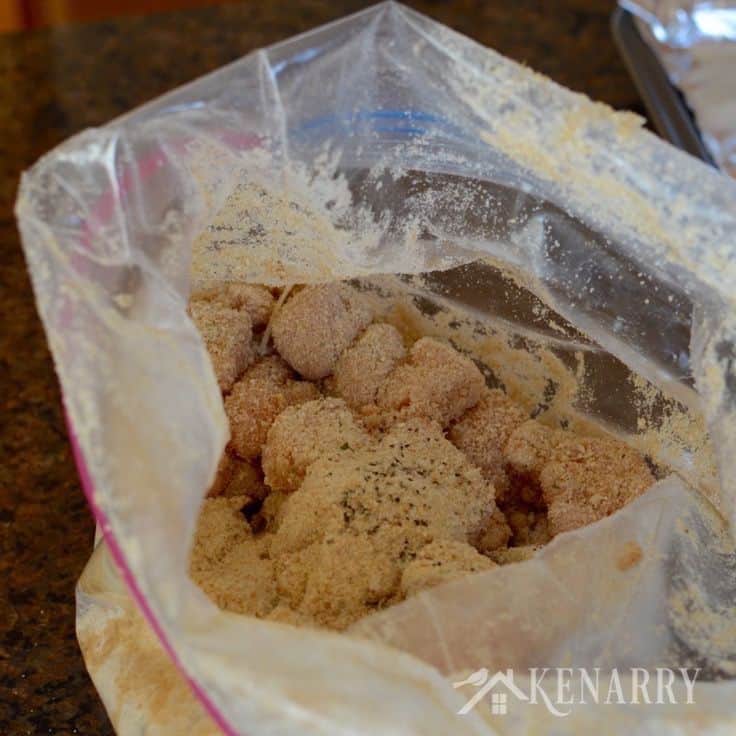 a plastic baggie filled with chicken and seasonings