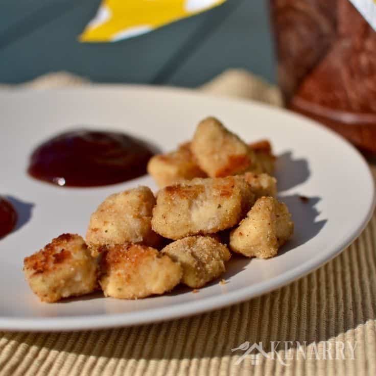A plate of chicken nuggets with sauce