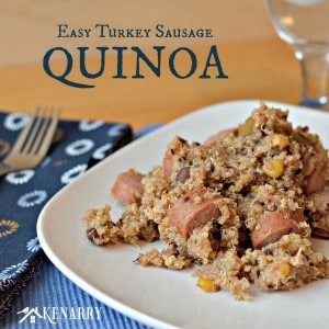 A plate of quinoa with sausage on a white plate