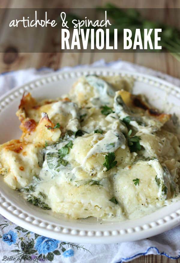 a plate of cheesy ravioli topped with parsley