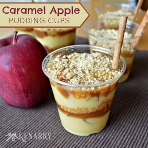 apple pudding in cups with streusel topping and cinnamon sticks