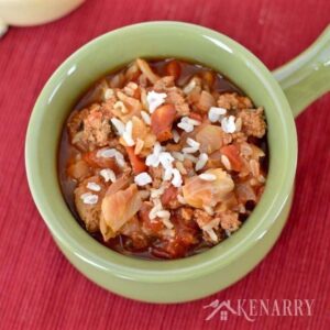 A green bowl of cabbage soup