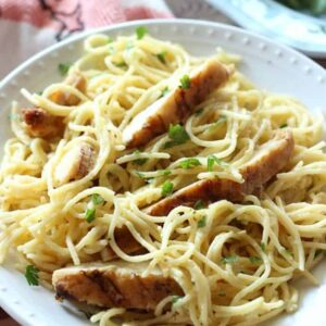 A bowl of pasta with chicken
