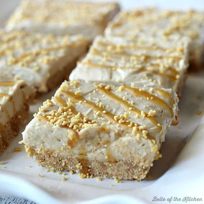 sliced cheesecake bars on a plate