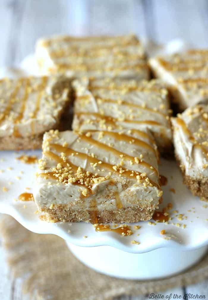 sliced cheesecake bars on a plate