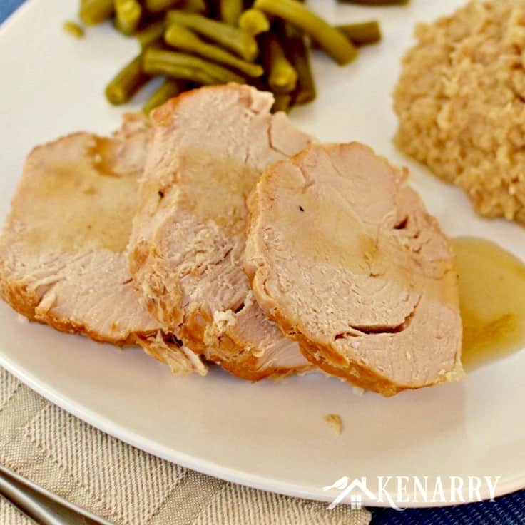 A plate of food turkey, green beans, and cauliflower