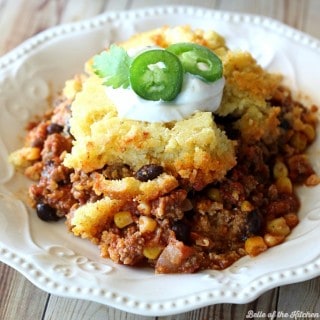 Do you like eating cornbread with your chili? Then you will love this Chili Cornbread Casserole! It's cooks together for a hearty, comforting dinner!