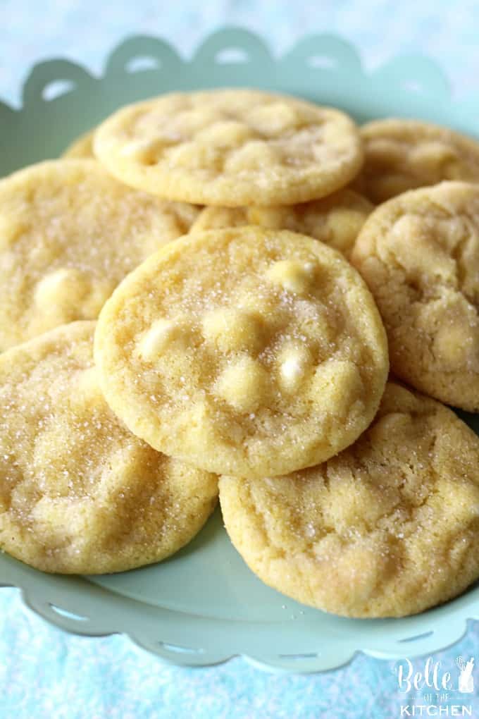 lemon cookies with white chocolate chips on a plate