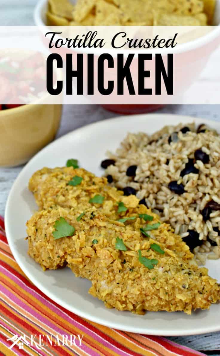 A plate of chicken tenders with rice and beans