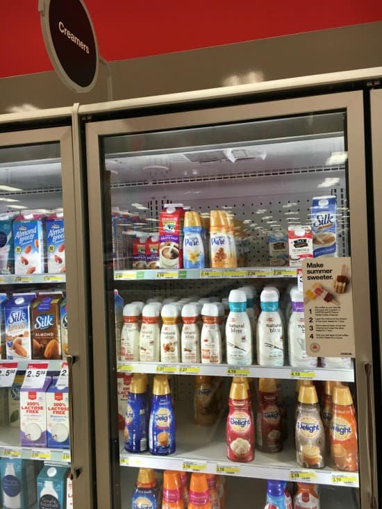 A store shelf filled with coffee creamer