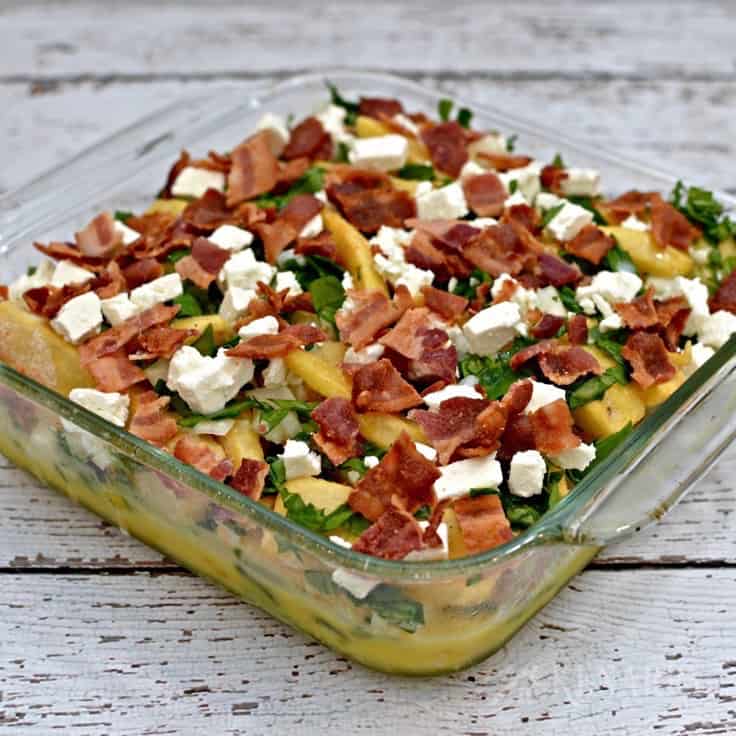 egg casserole with bacon in a square baking dish