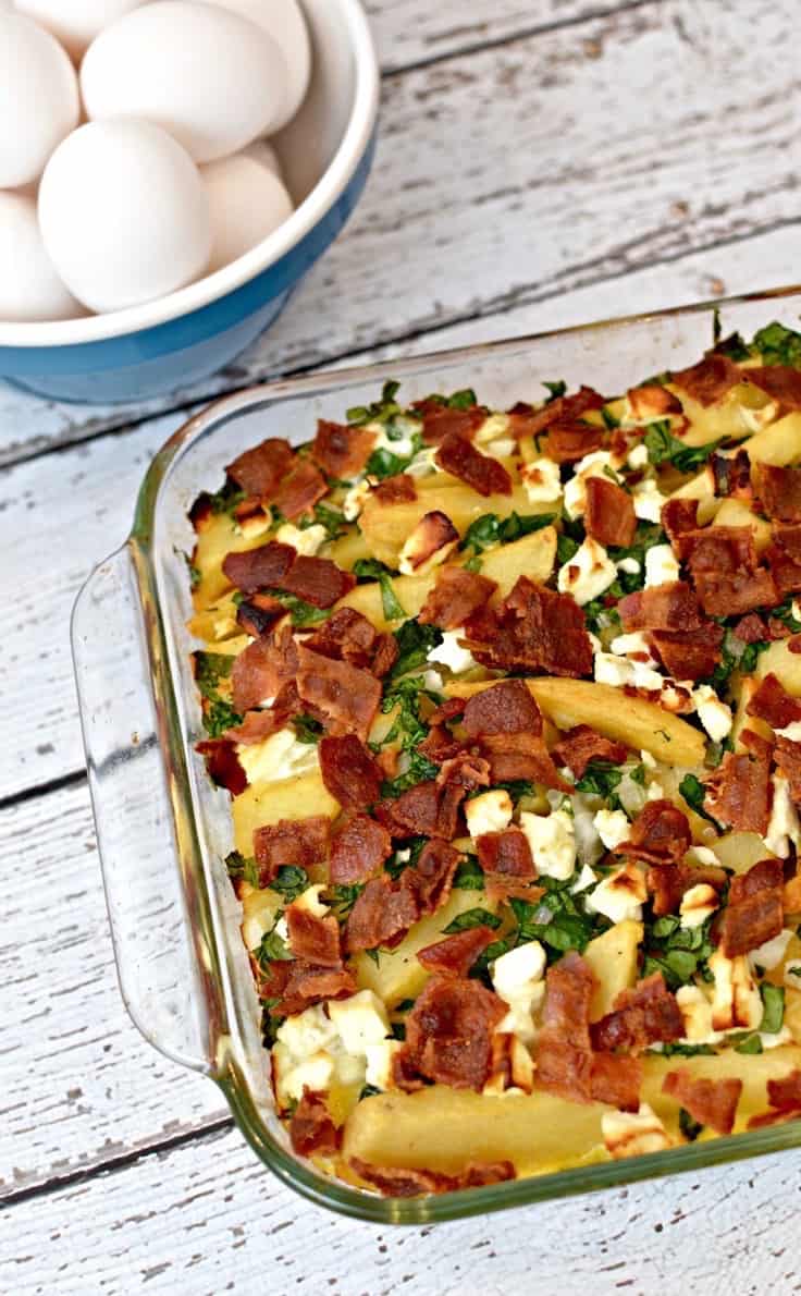 egg casserole with bacon in a square baking dish
