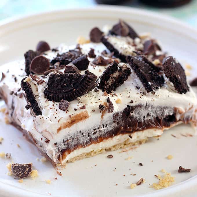 A piece of cake with Oreos on a plate