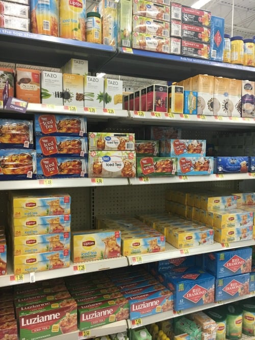 A store shelf filled with tea