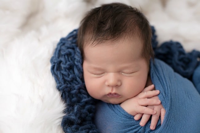 A baby with brown hair