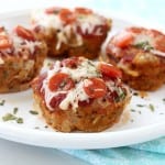 Mini Pizza Meatloaves - traditional meatloaf gets a fun twist when made miniature sized and pizza style! Plus, they're a leaner dinner option thanks to ground turkey, coming in at less than 150 calories each!